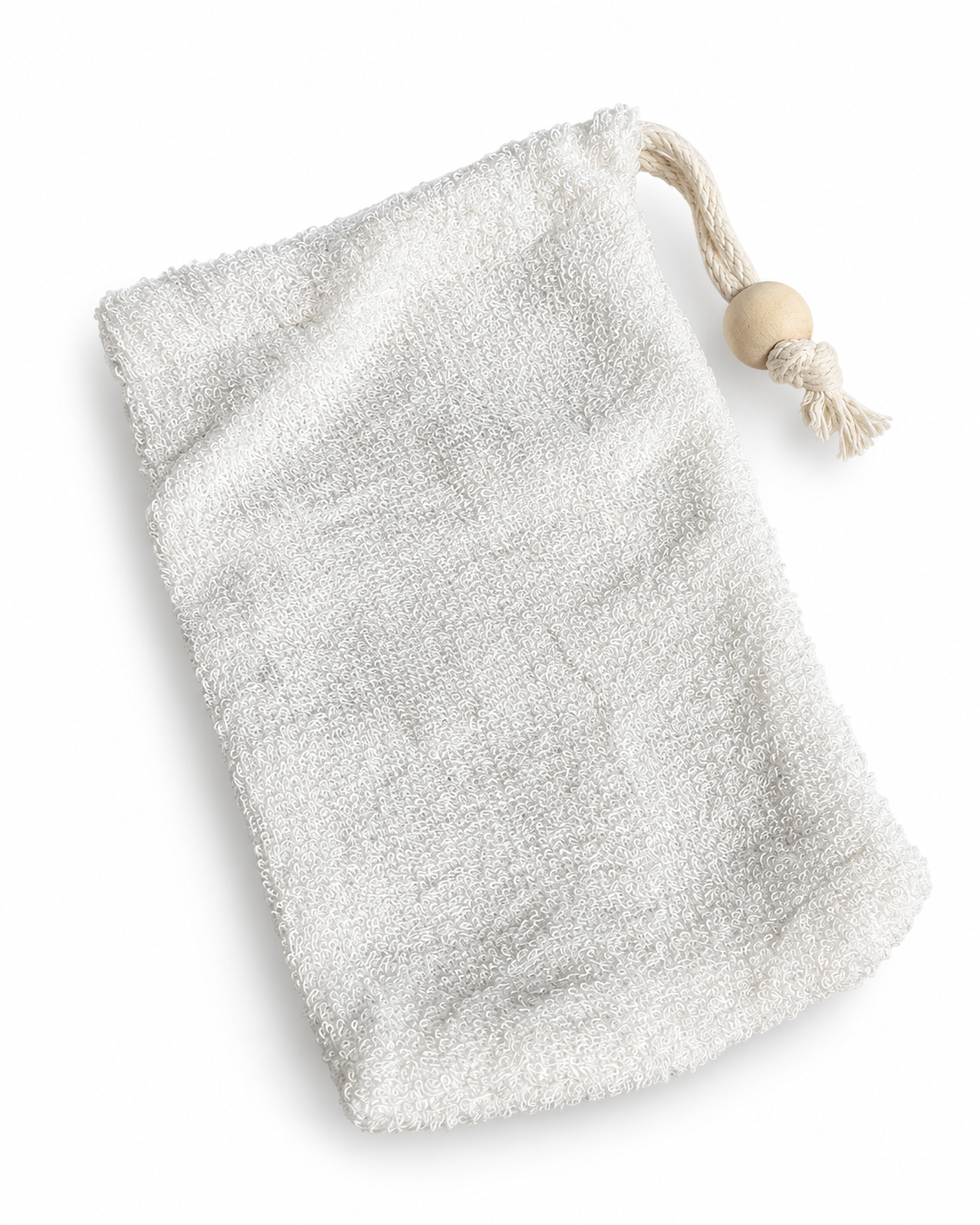 Natural bamboo exfoliating soap saver bag with cotton drawstring and wooden bead on a white background.