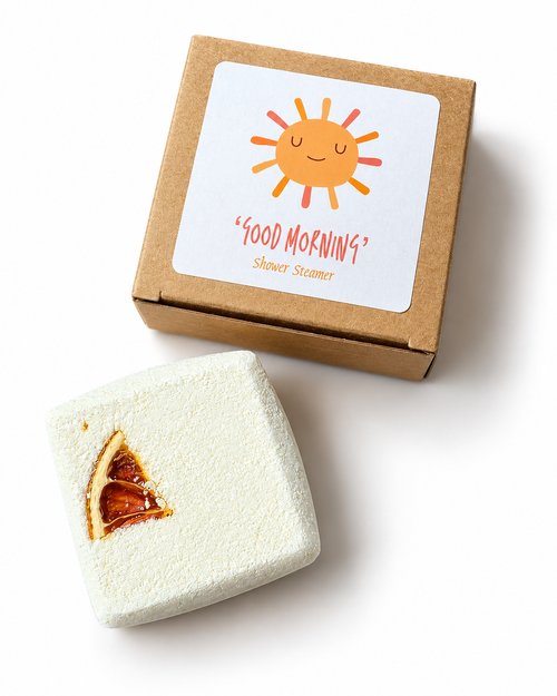 Good Morning citrus aromatherapy shower steamer with Orange, Bergamot and May Chang essential oils, presented in a gift box.
