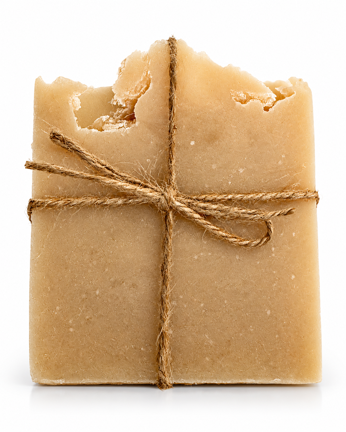 Handmade Lime and Patchouli vegan soap bar with pink kaolin clay, wrapped in natural twine.